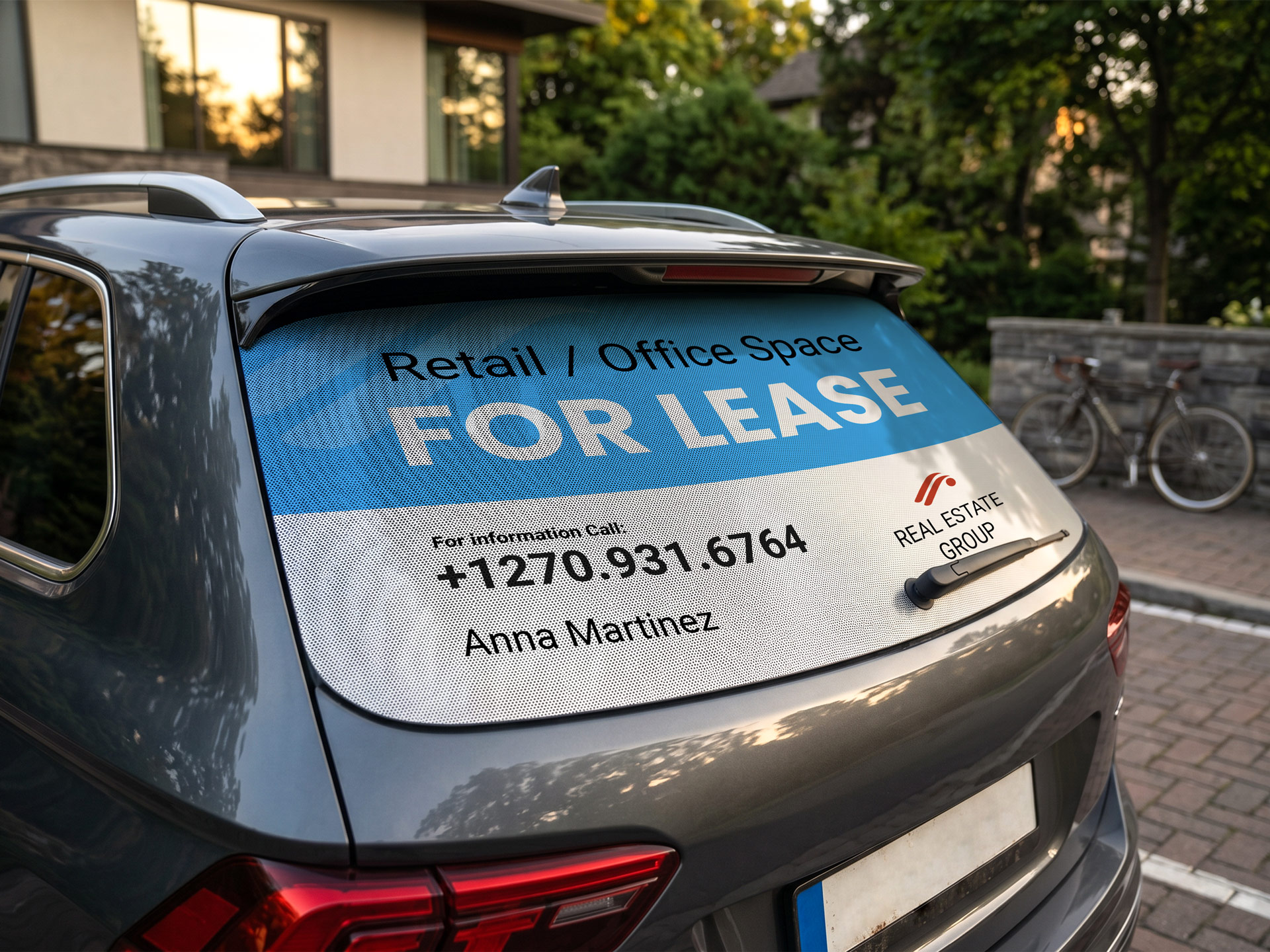 Retail perforated car window decal reading For Lease