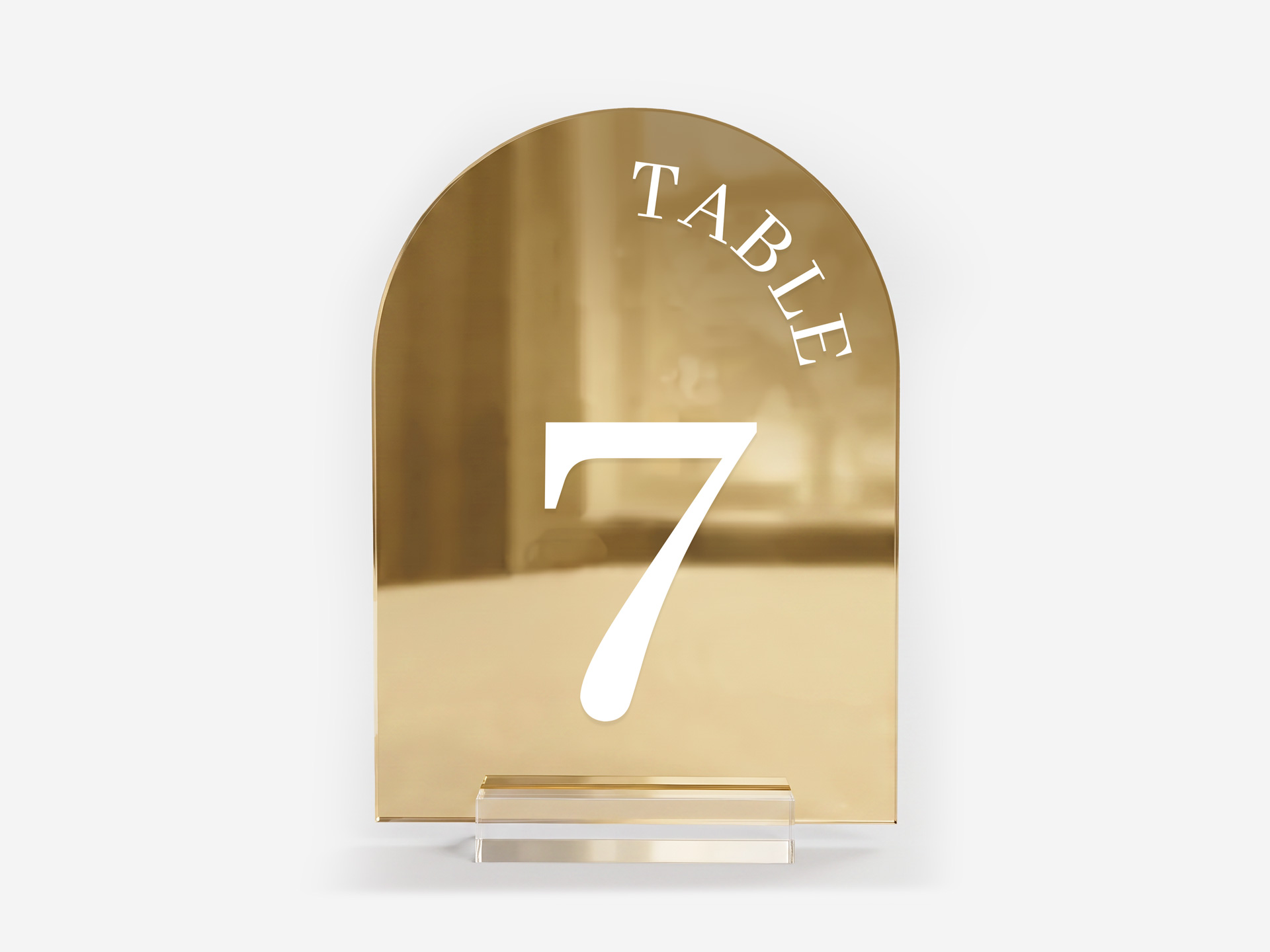 Gold acrylic wedding table number featuring Table 7 lettering