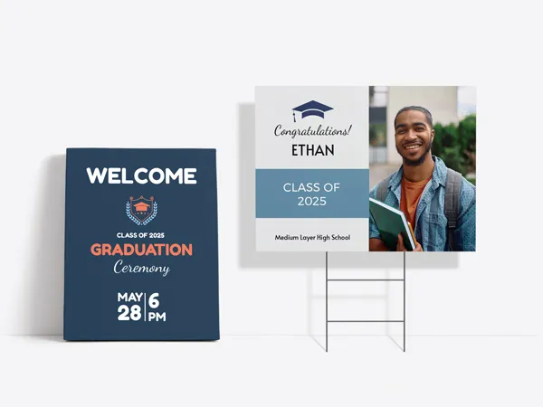 Custom graduation signs including a yard sign and a board welcoming people to a graduation ceremony.