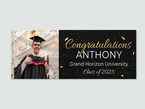 Graduation signage with black and gold theme featuring student photo and gold confetti