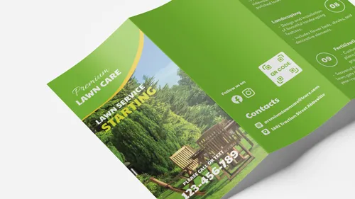 Brochure printing paper material designed for lawn care featuring a green yard and contact details