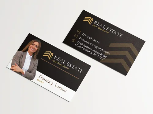 Real estate business cards with portrait of female realtor on black background