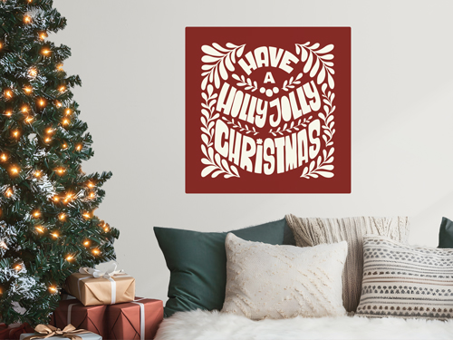 Red square wall decal featuring “Have a Holly Jolly Christmas” in decorative white typography next to a Christmas tree.