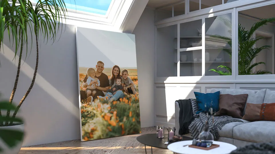 Family-themed large canvas print leaning against the living room wall.