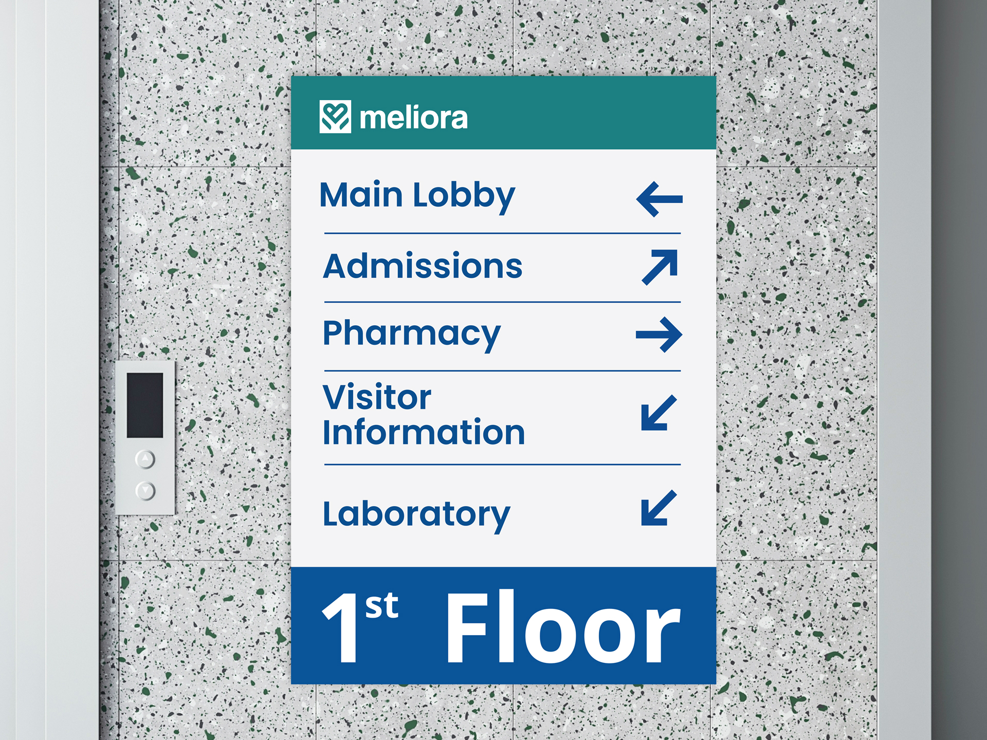 Hospital directional sign guiding visitors to lobby, admissions, pharmacy, and lab.