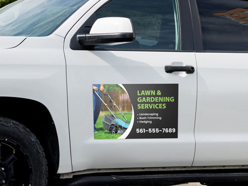 Informative car magnet for lawn and gardening business listing its services and contact details.