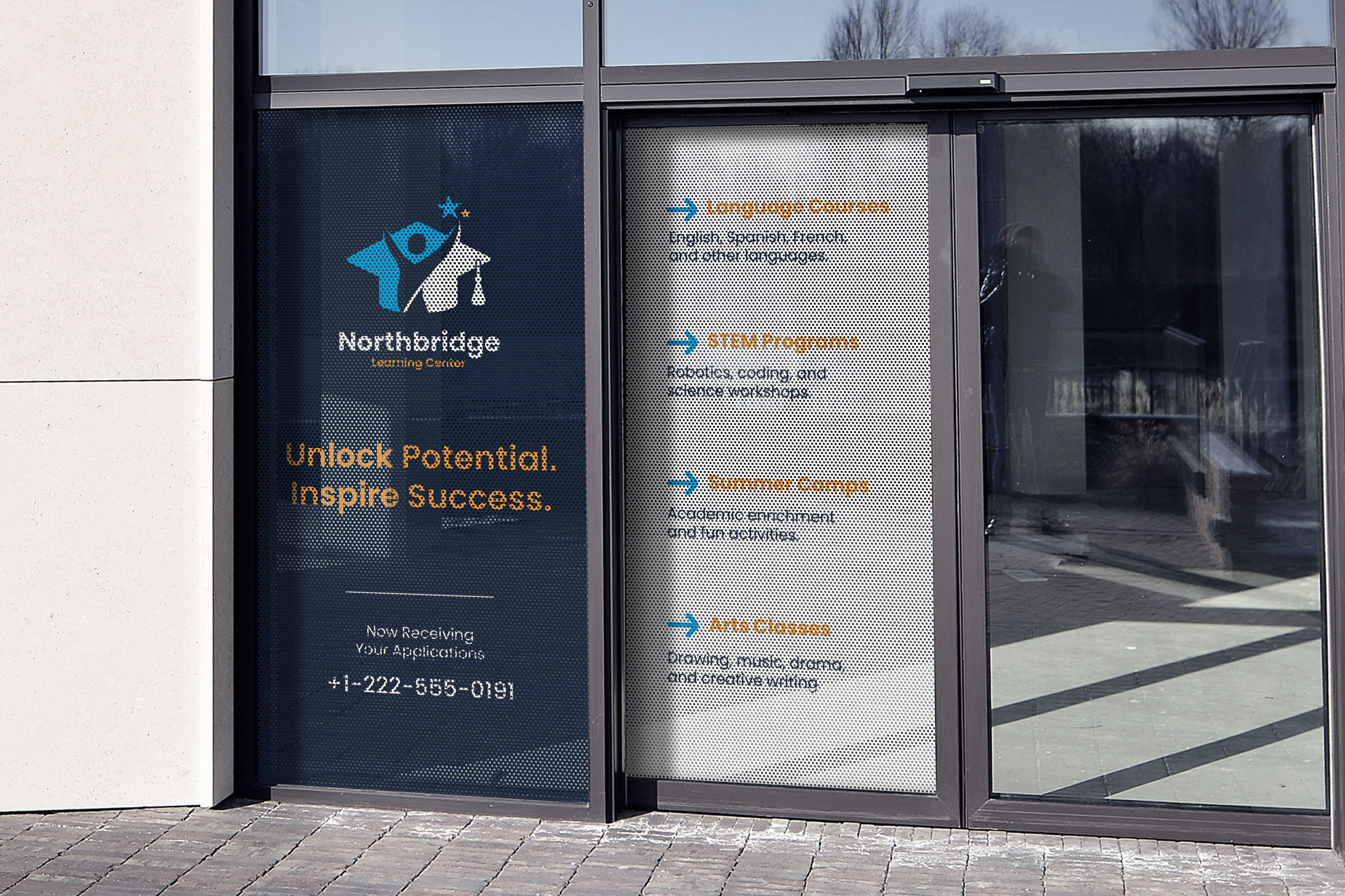 A learning center perforated window decals applied to two windows