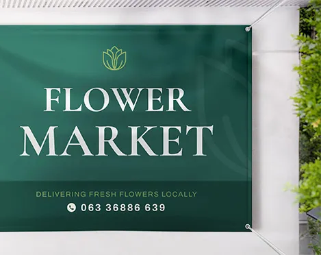 Green outdoor banner reading flower market with logo and contact details