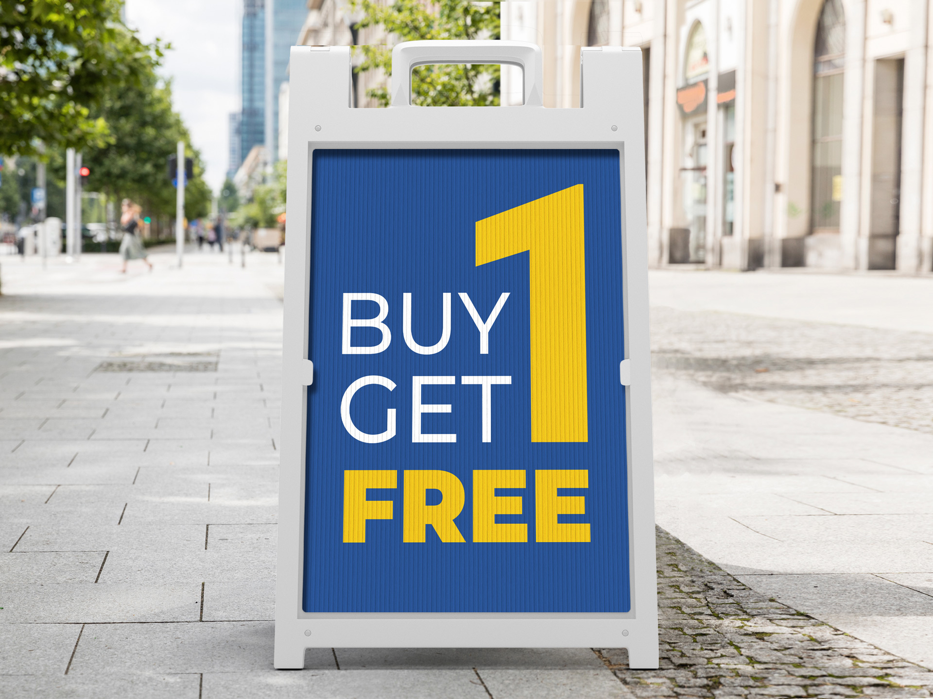 A retail sidewalk a-frame sign telling people about a buy one, get one free deal.