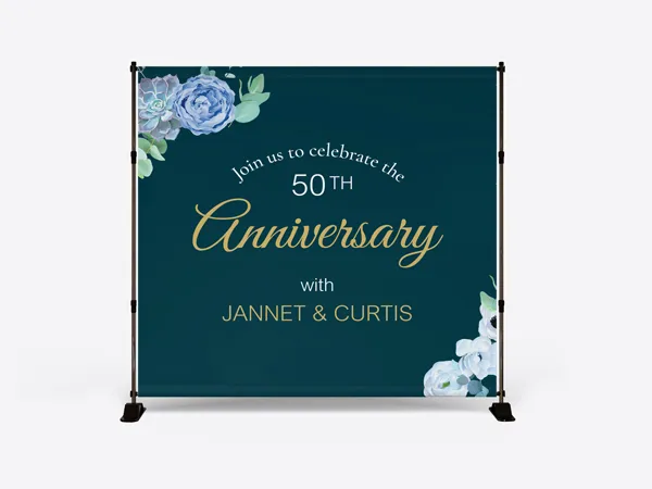 A custom party backdrop featuring an anniversary event's details.
