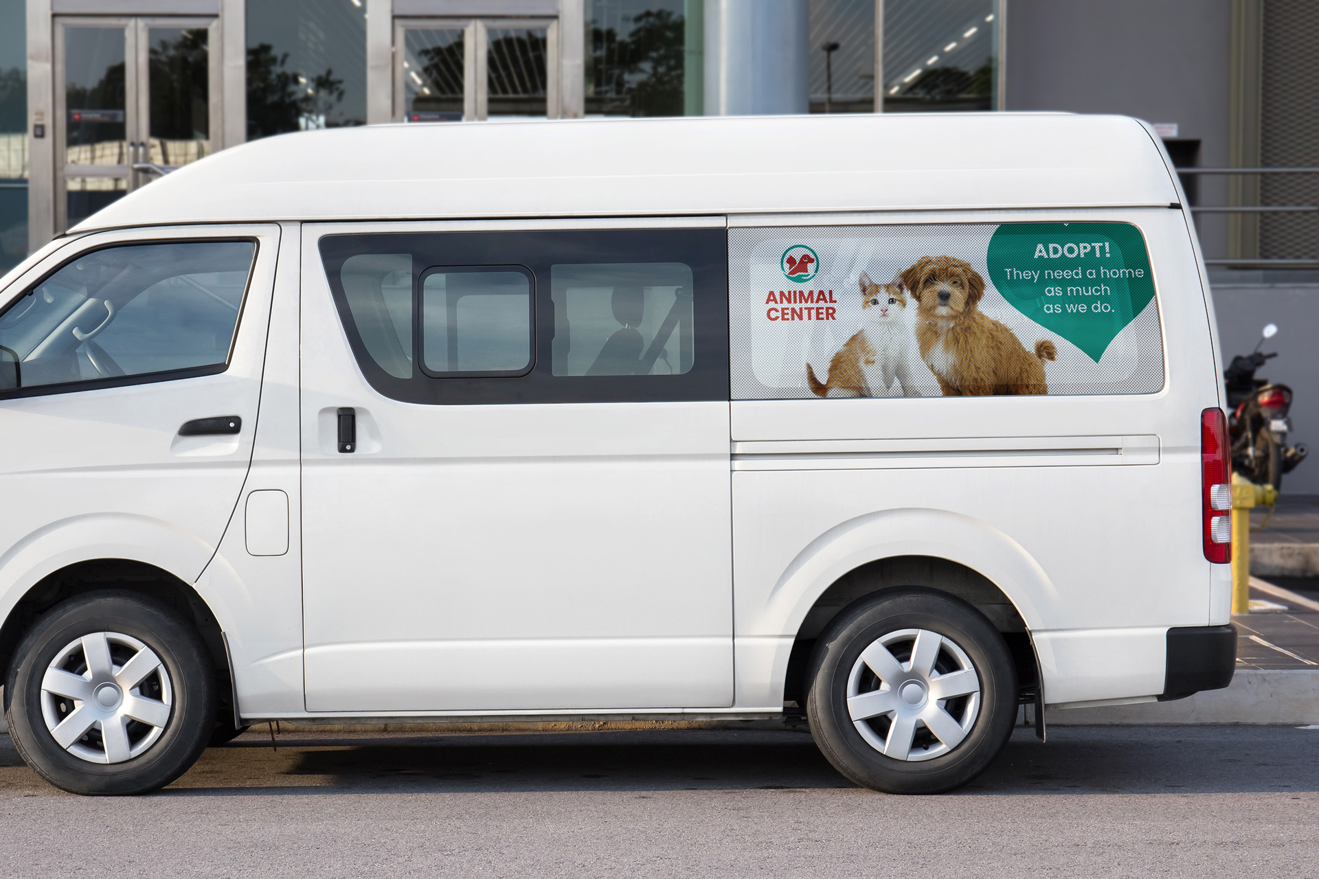 A van featuring perforated back window decal