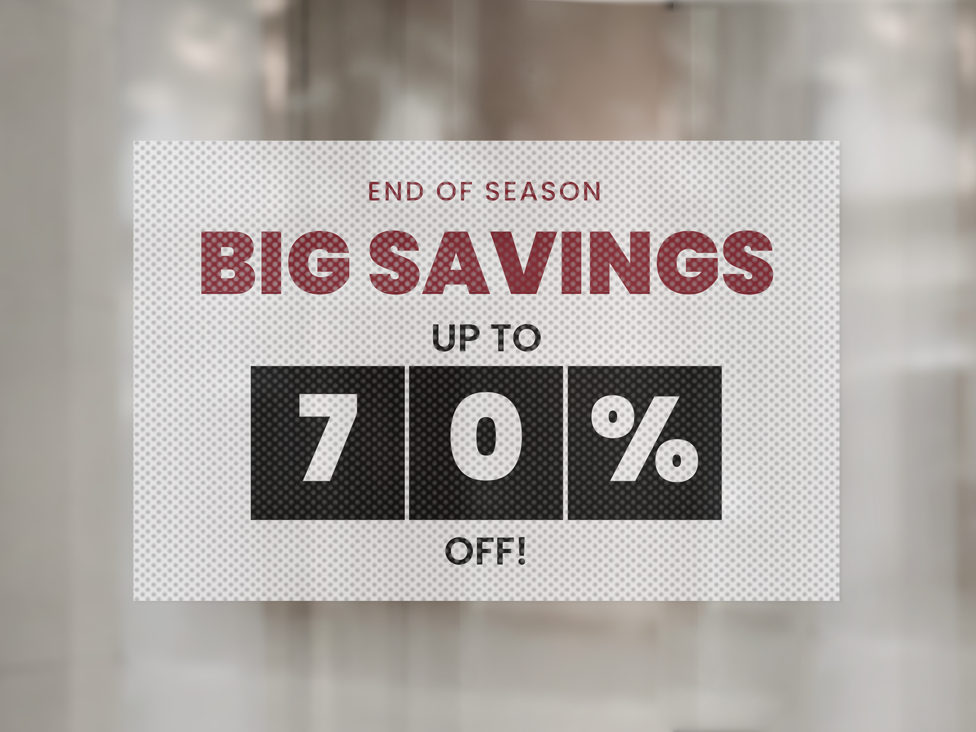 Perforated window decal announcing 70% off sale.