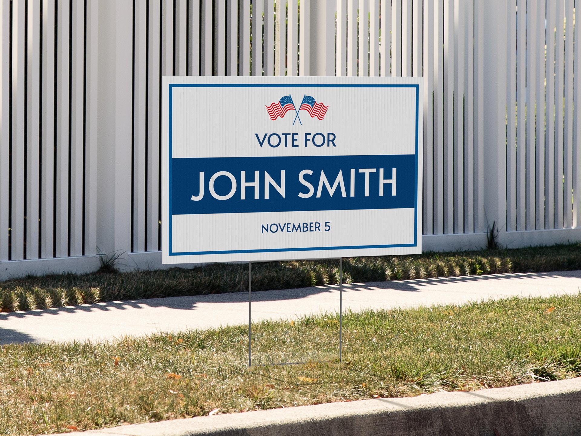 blue and white custom corrugated political campaign yard sign placed on a lawn