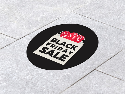 Black Friday floor decal with a white shopping bag design and red 30% off tag.