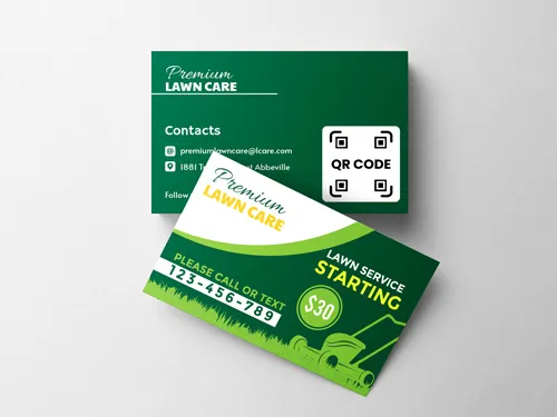 Premium lawn care business cards showcasing promotional offers and company branding