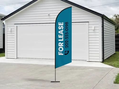Real estate sign in blue displaying a property available for lease