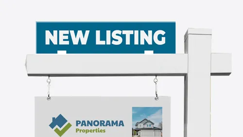 Notable real estate sign promoting a new listing for a property on a blue background