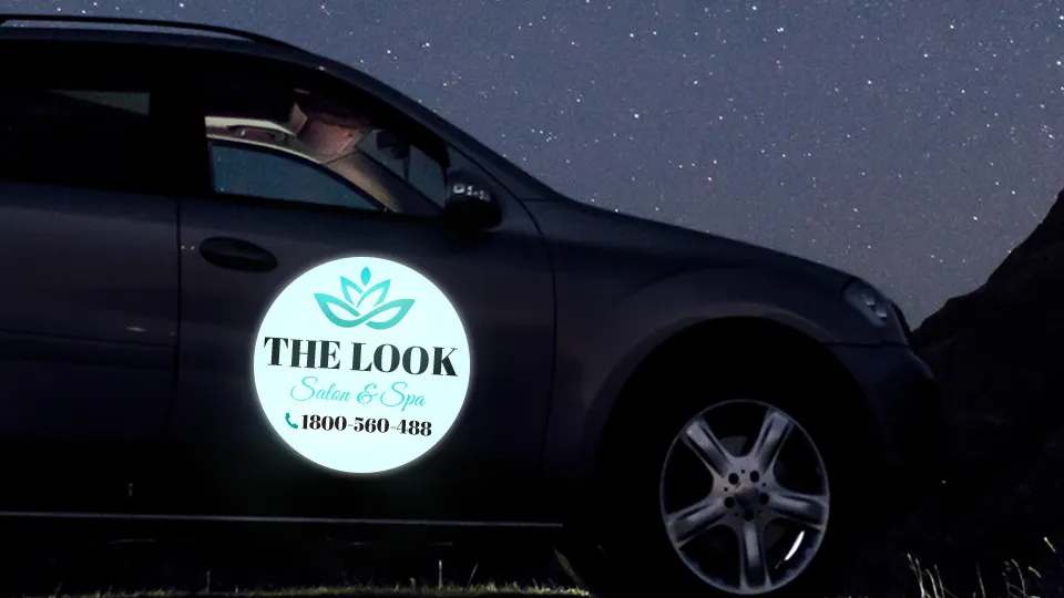 Reflective car decal for the Look Salon & Spa applied to the front door of a car.