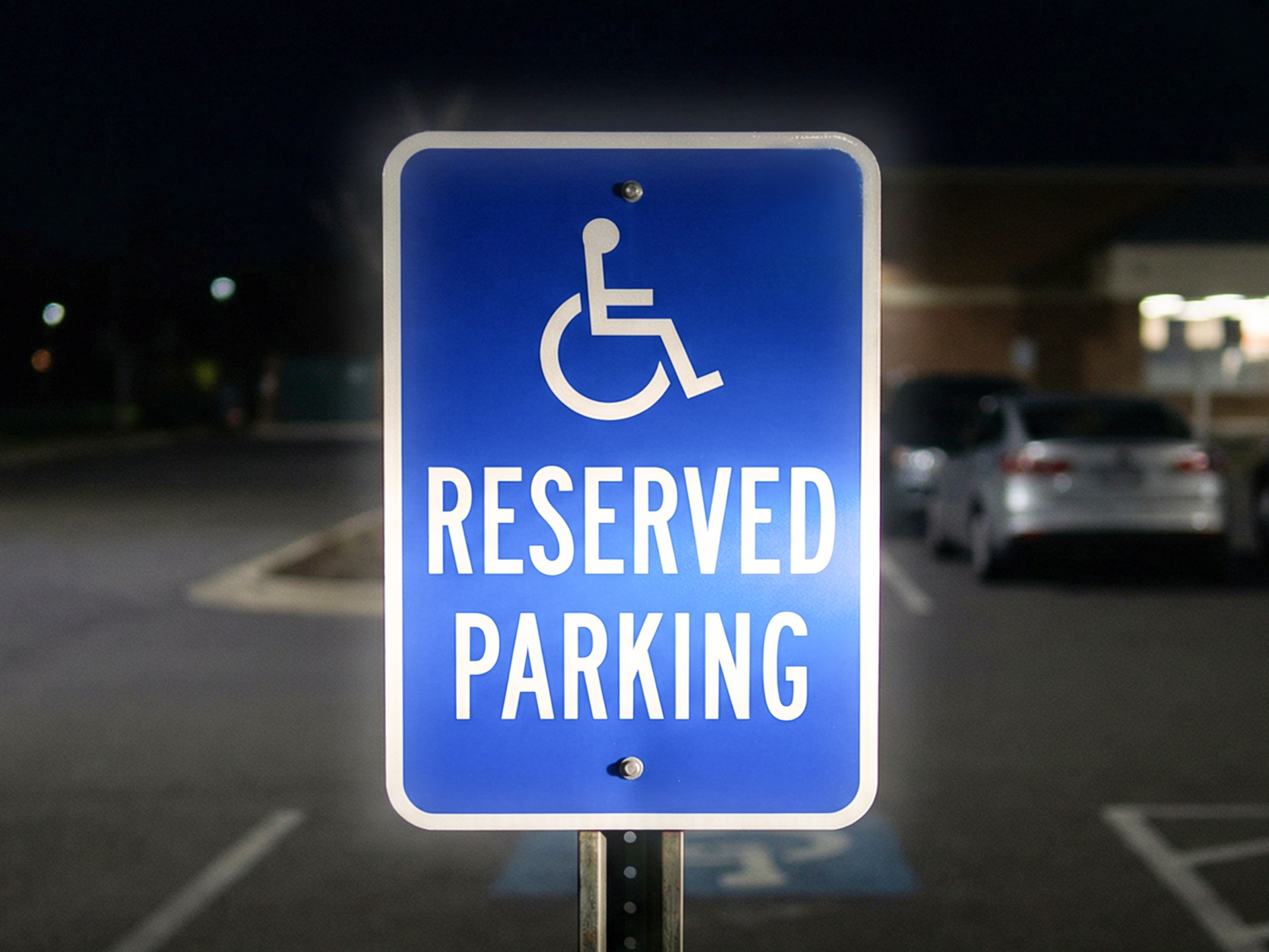 Reflective blue handicap reserved parking sign