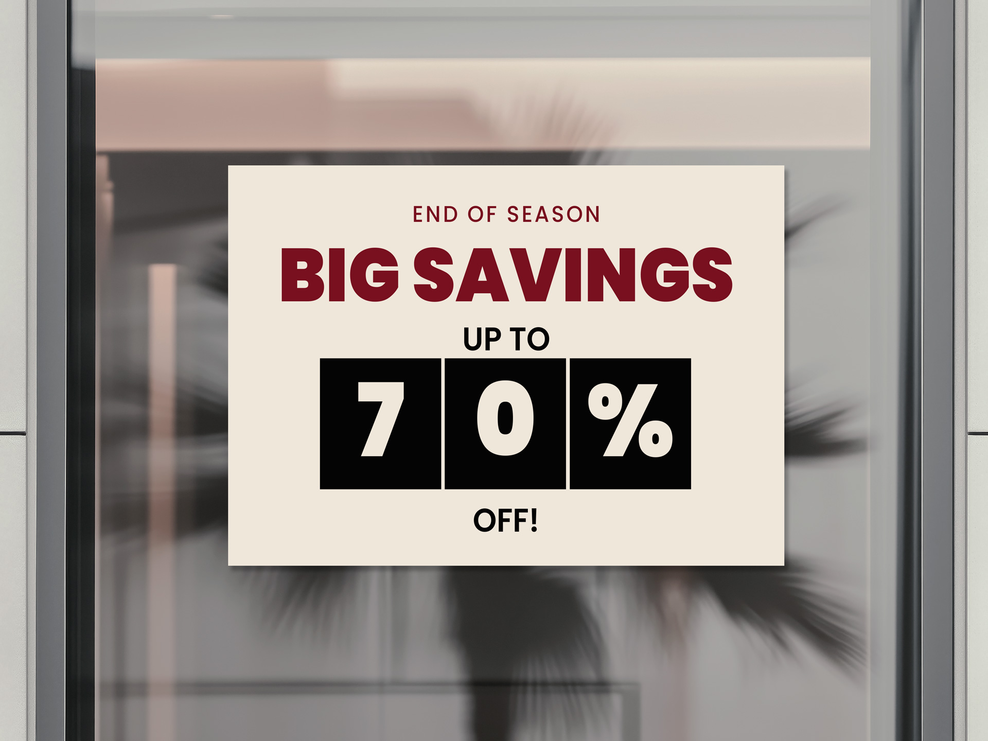 Window decal promoting end of season sale.