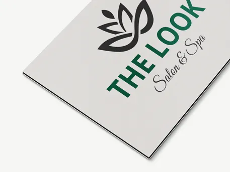 Black and green salon and spa dibond sign reading the look