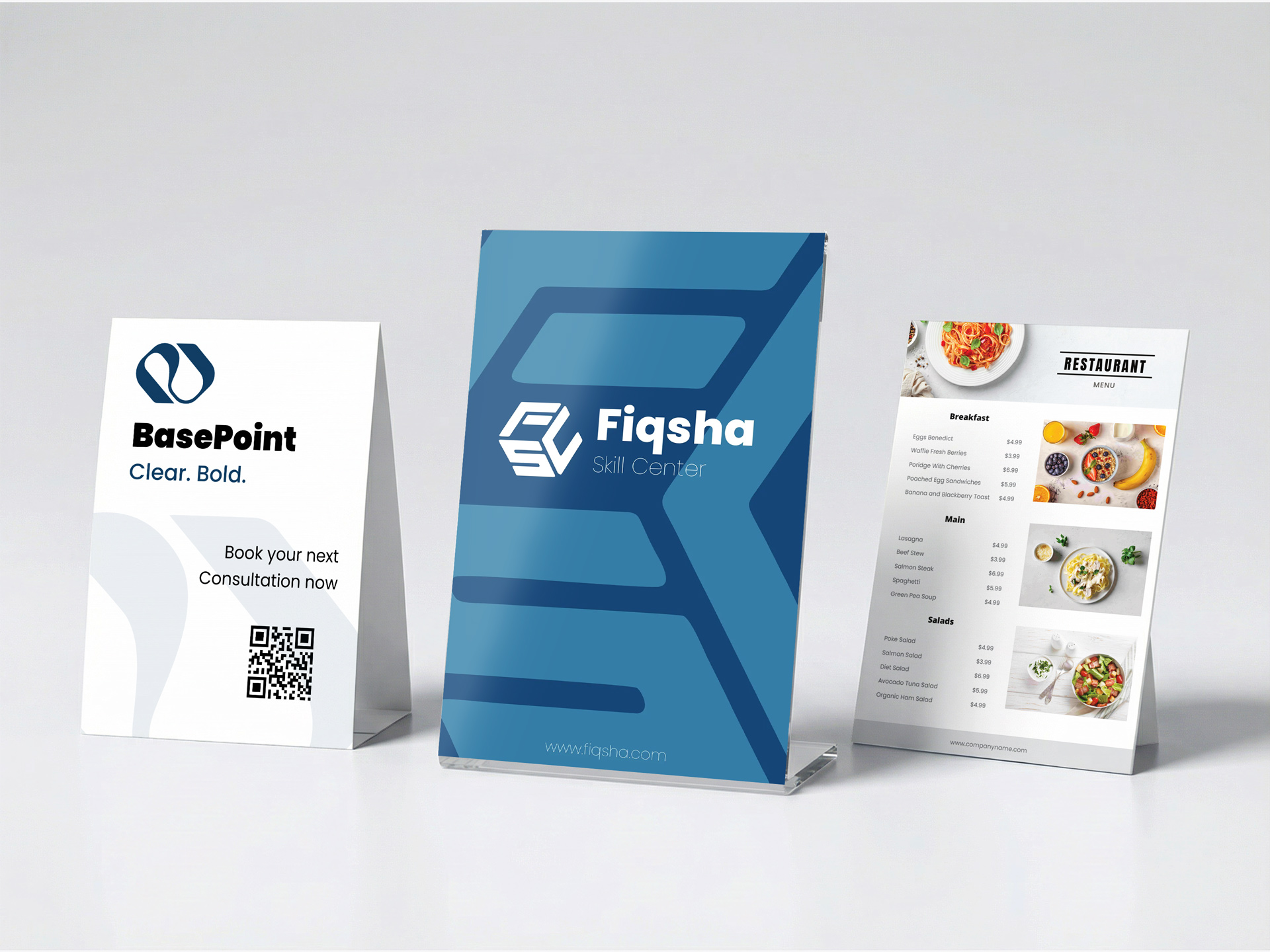 A selection of three custom tabletop signs.