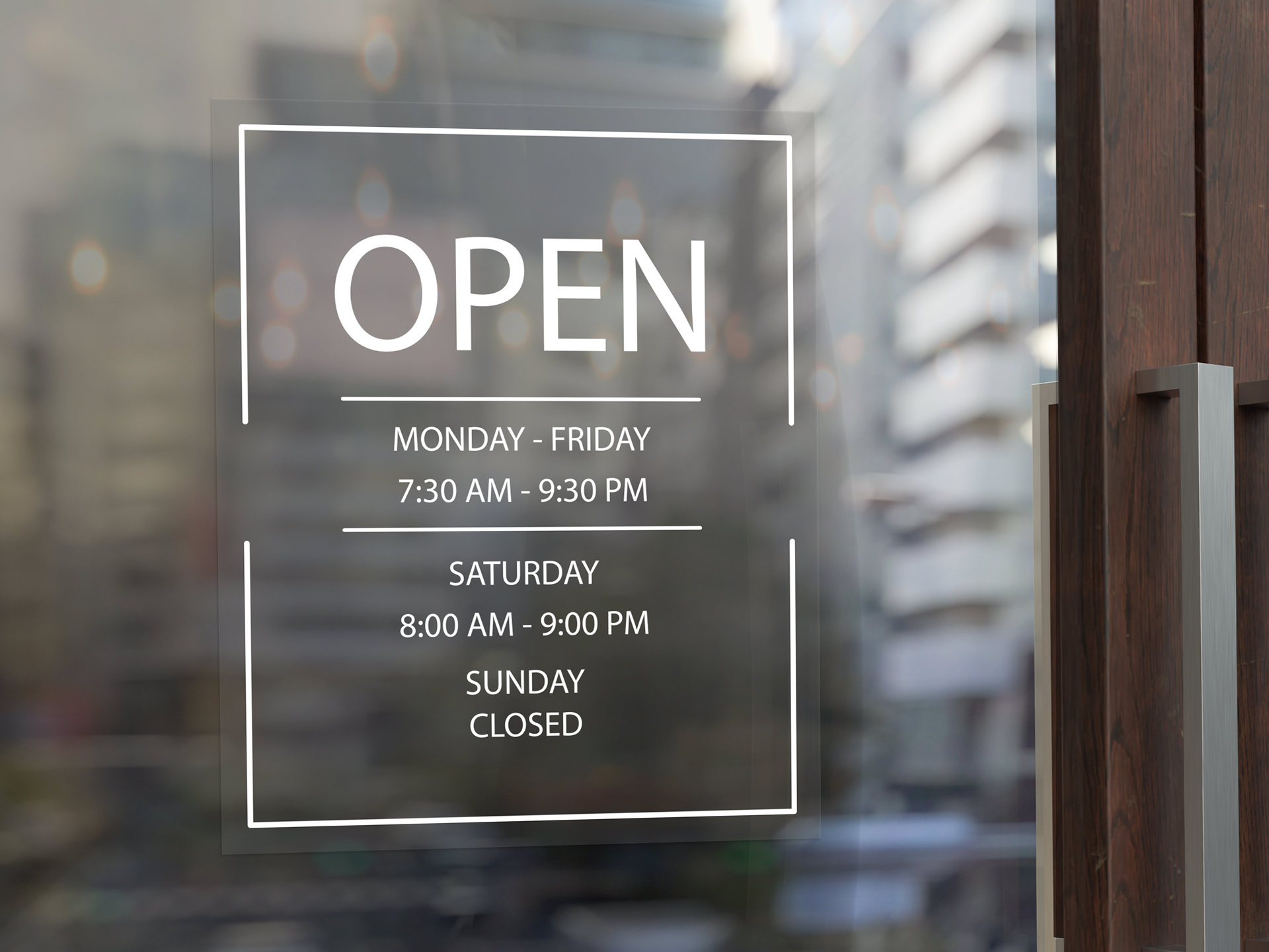 transparent window decal showcasing business hours