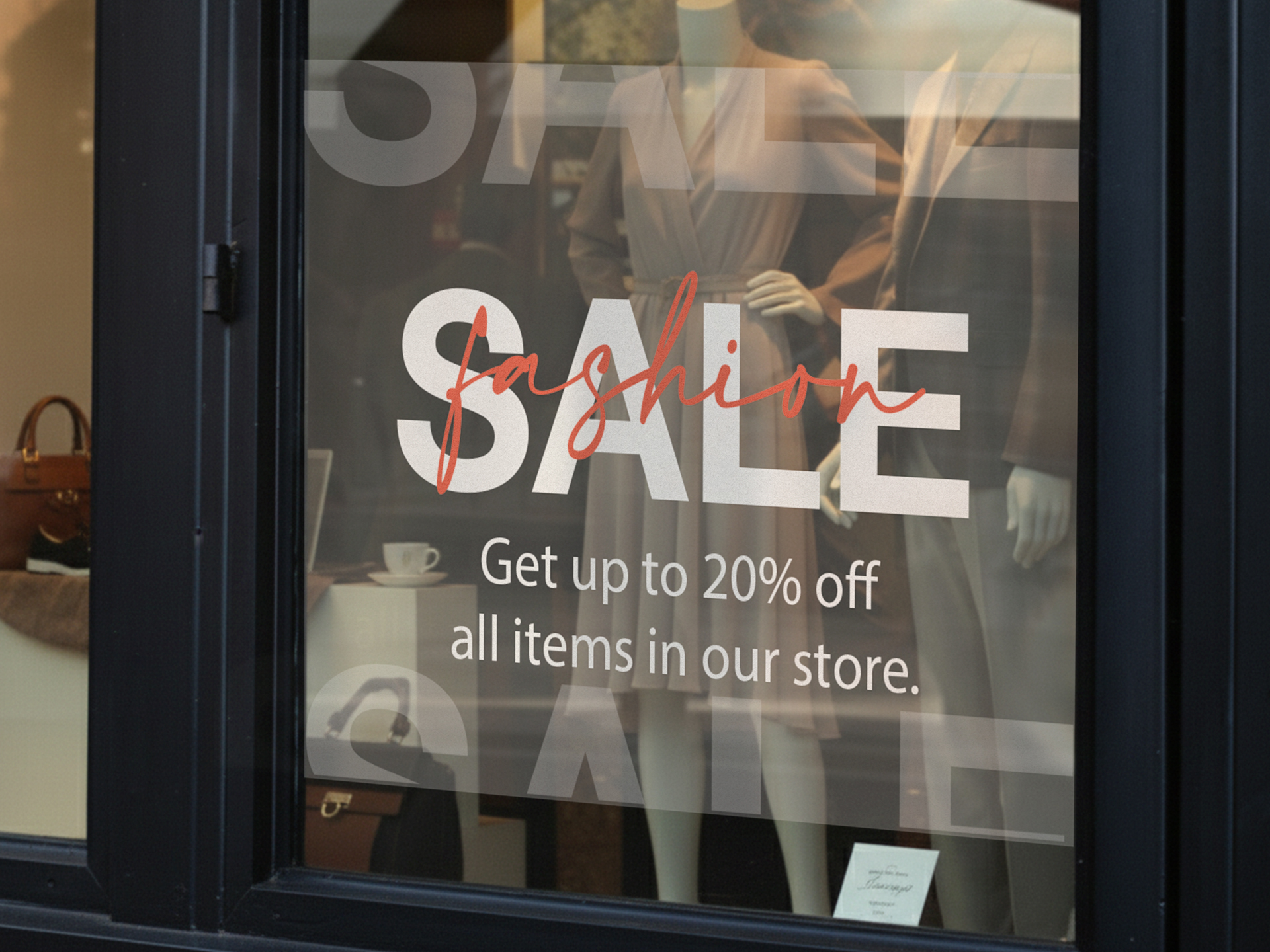 Clothing store window decal promoting sales.