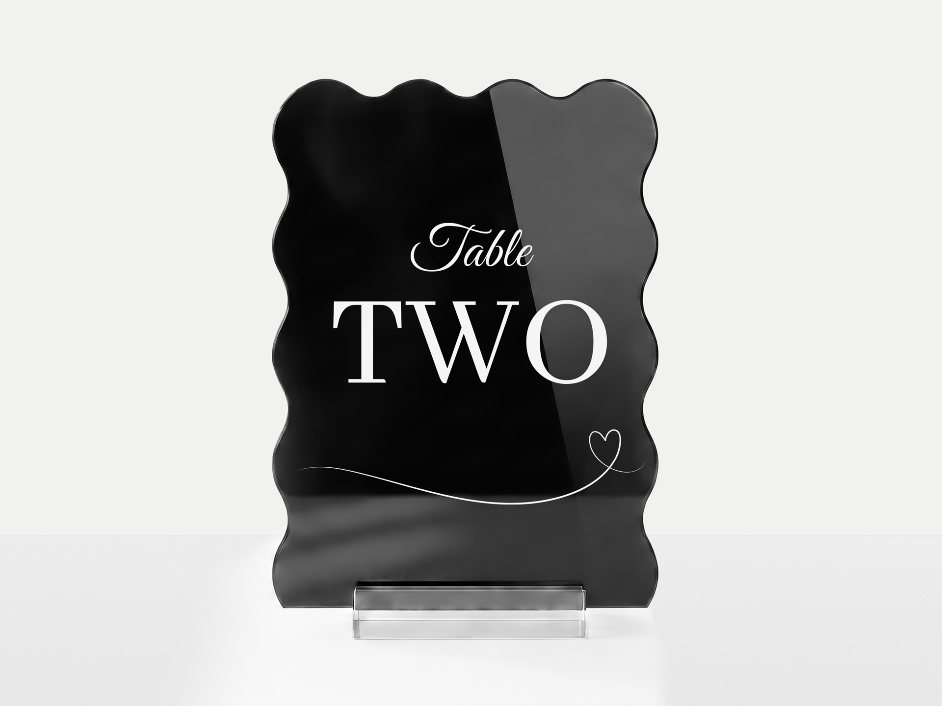 Black acrylic table number indicating the second table