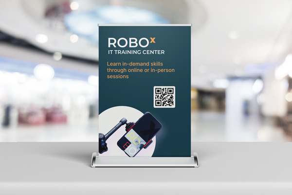 Trade show tabletop retractable banner set up on a table at an event.