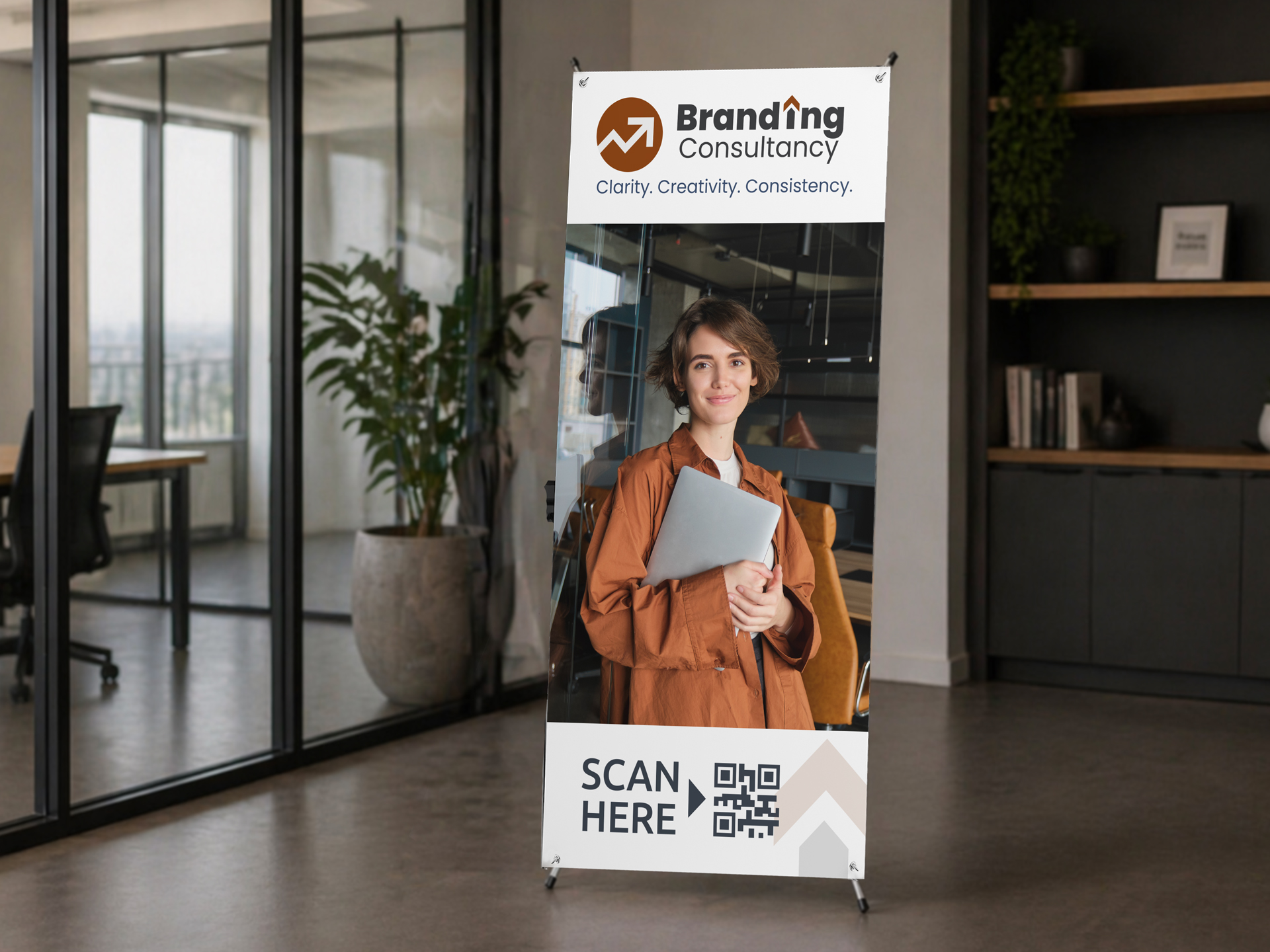 office x-banner stand displaying company logo and QR code