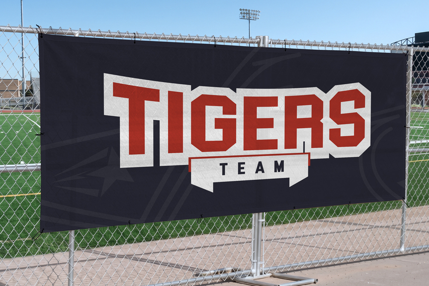 Club branding soccer banner on fence