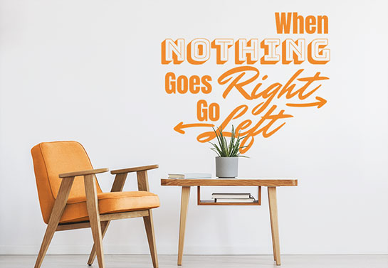 Orange lettering on a wall Orange-lettering-on-a-wall