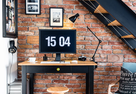 Stone-style-wall-in-a-rustic-home-office