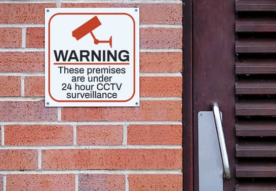 Warning-survellience-wall-signage