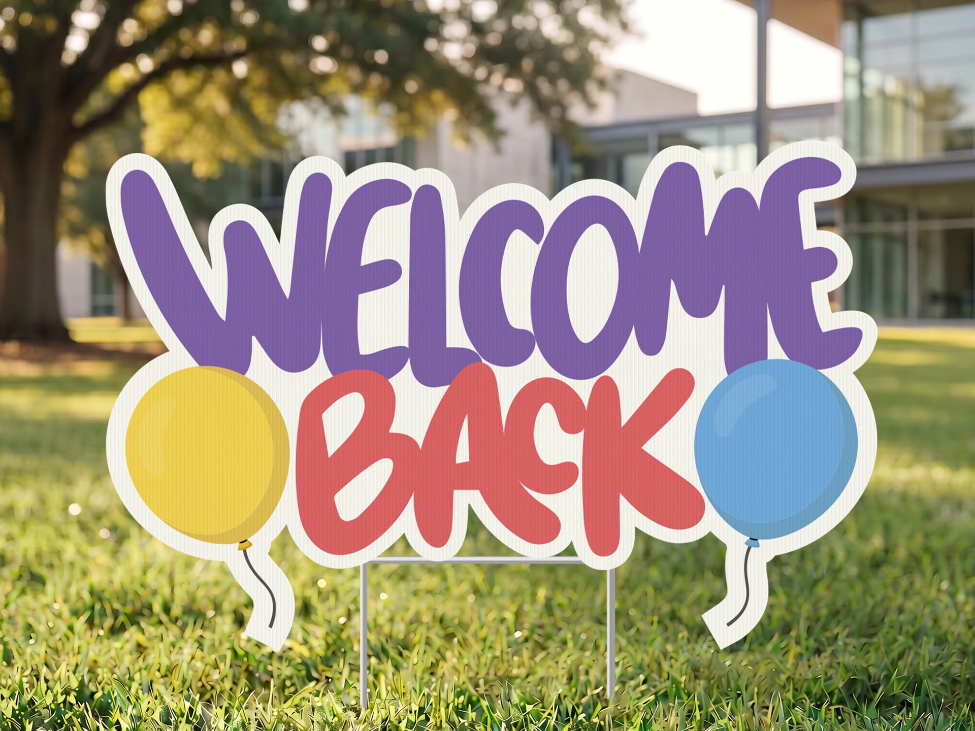 Welcome back colorful yard sign with ballons.