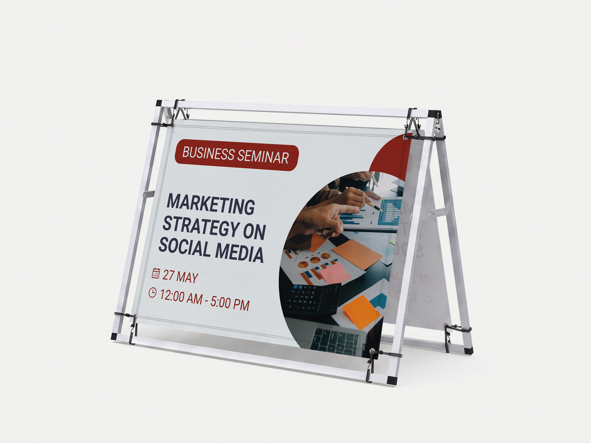 A-frame banner display featuring business seminar information.