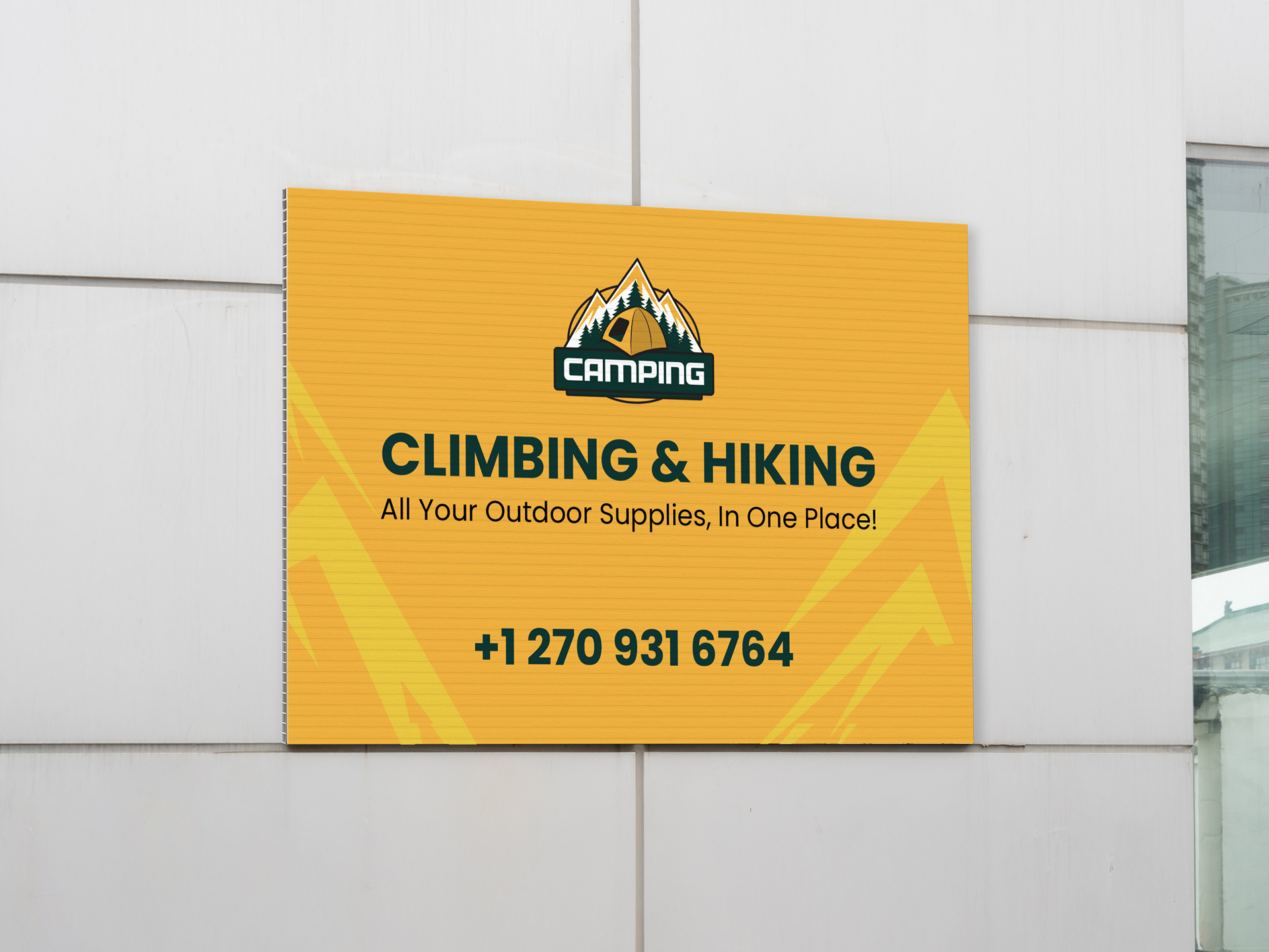 yellow corrugated plastic sign advertising a camping and outdoor supplies store