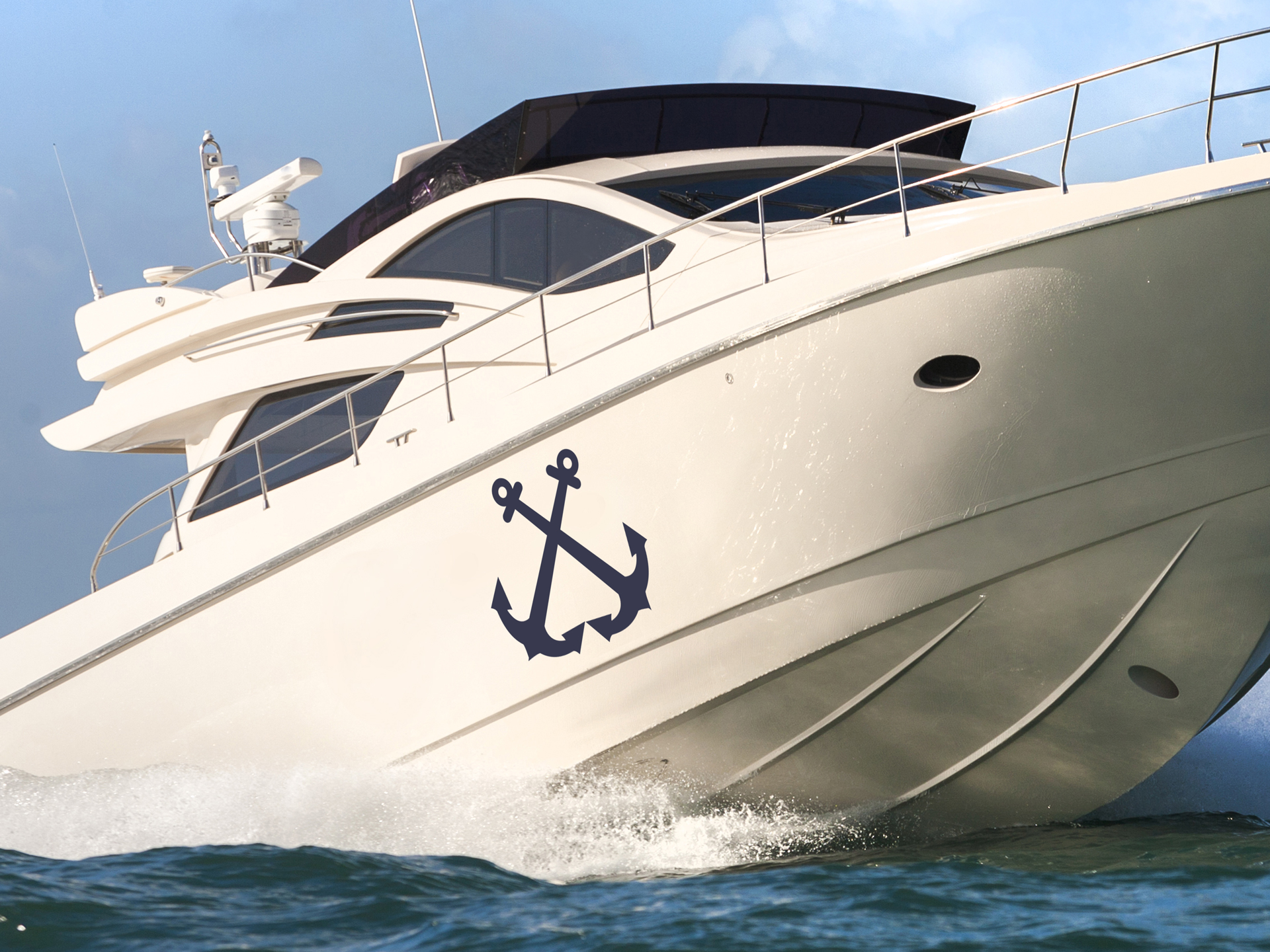 A navy anchor boat decal graphic decorating the bow.