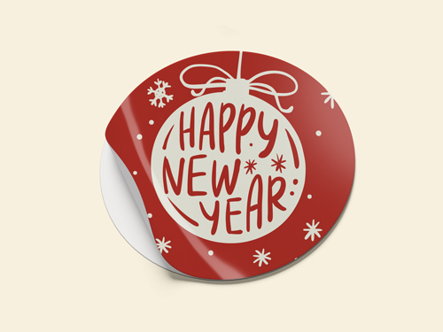 Round red holiday sticker with “Happy New Year” ornament design and snowflake accents.