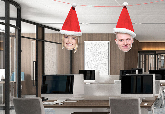 hanging-employee-photos-wearing-santa-hats