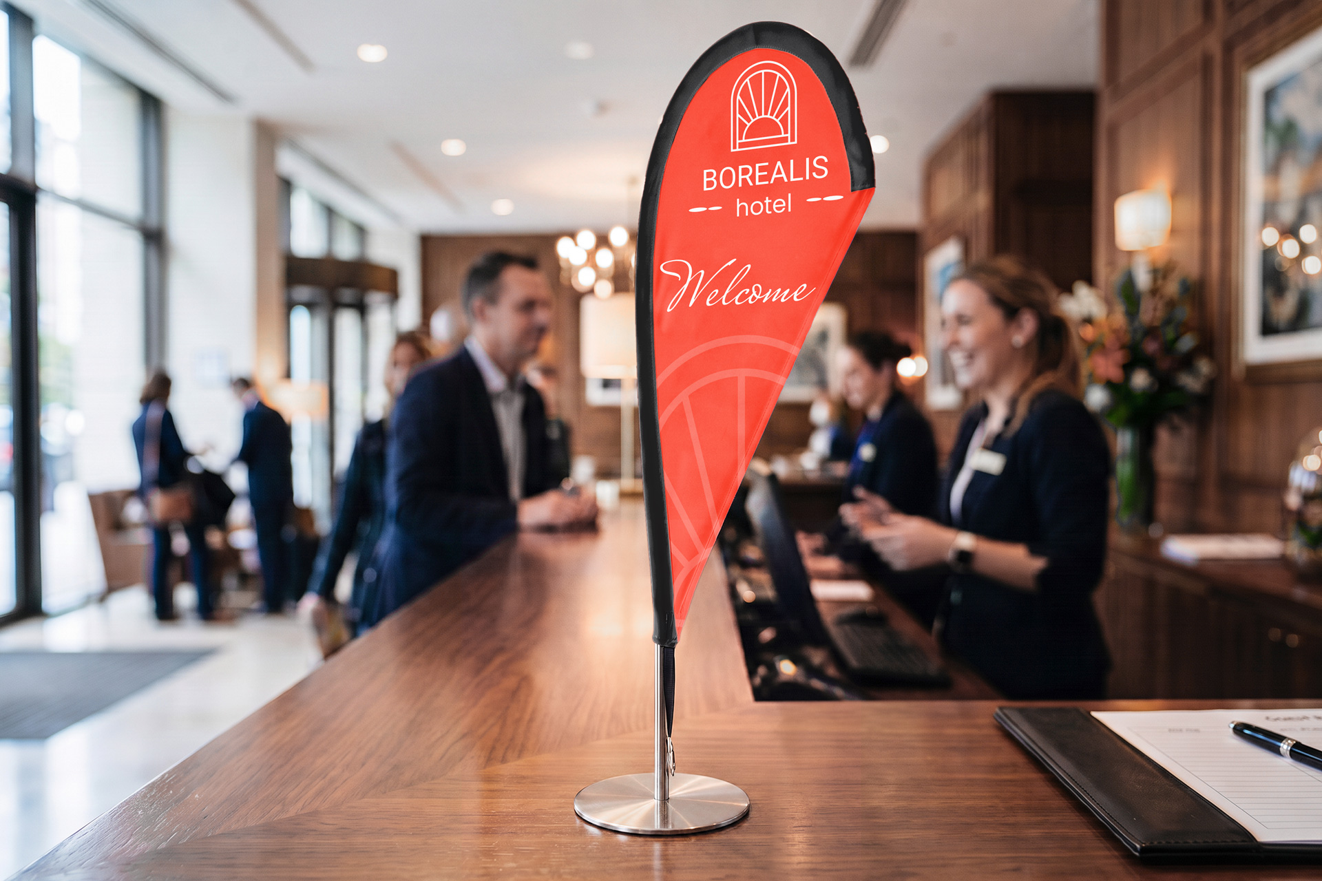 Hotel front desk mini teardrop flag with a company logo and welcome message.