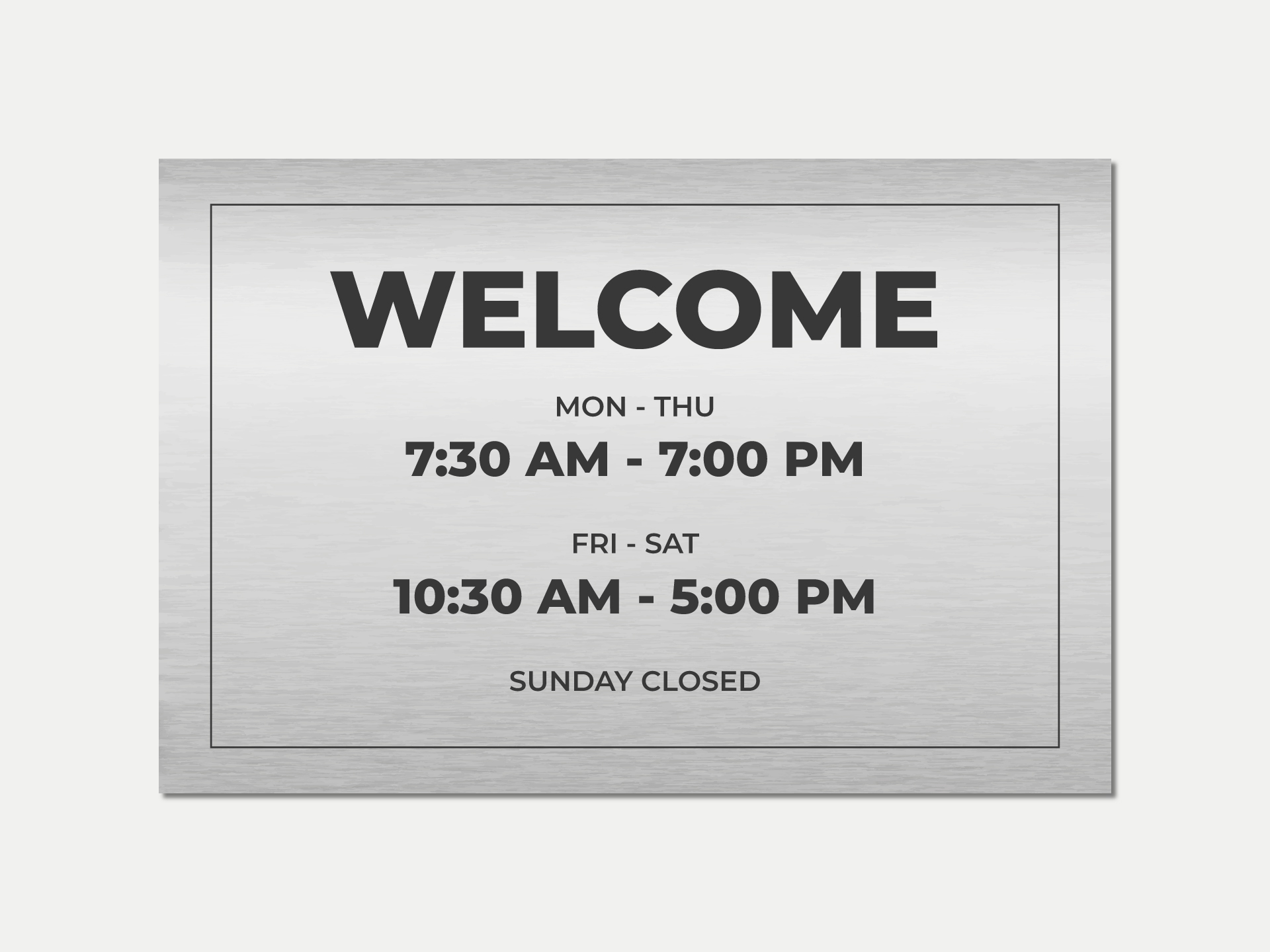 Metal business sign displaying working hours.