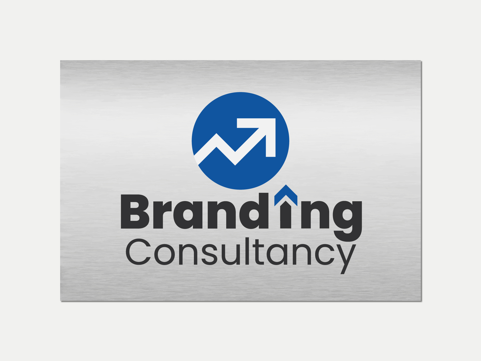 Brushed metal logo signage for business branding.