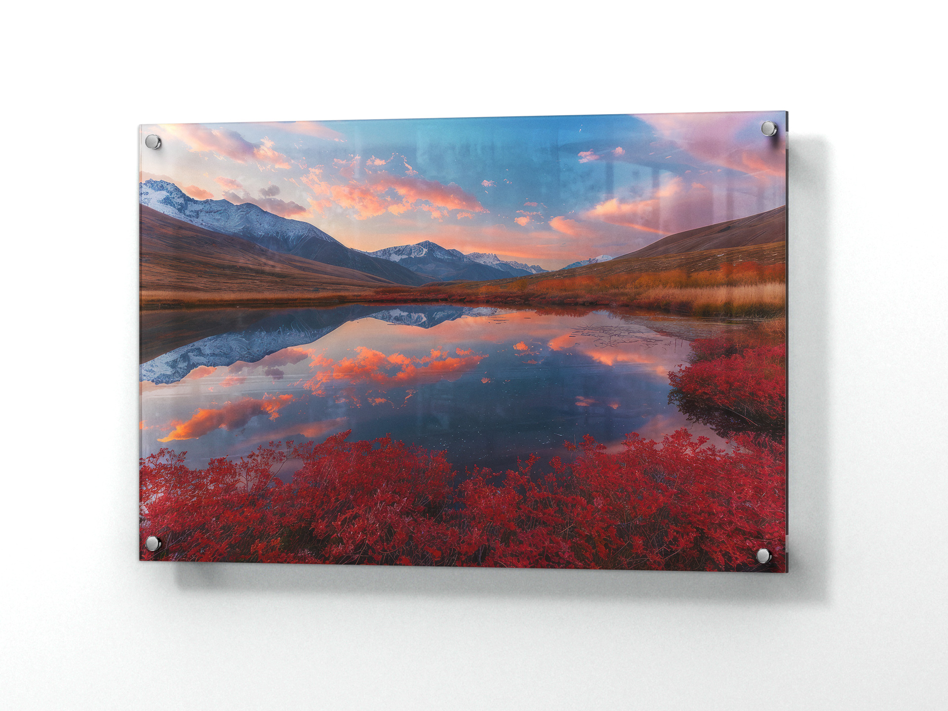 A mountain lake acrylic art print mounted on a white wall.