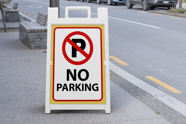 Clean sandwich board with a prohibition mark and No Parking text.
