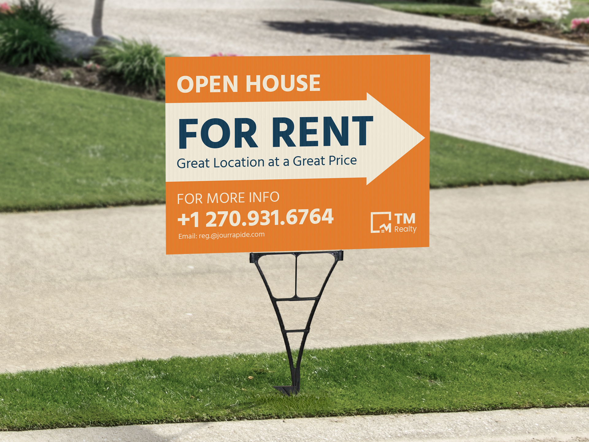 Open house sign fixed next to a pavement directing to a property for renting.