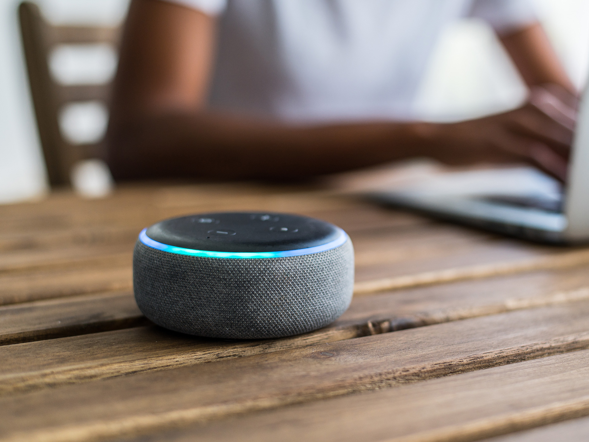 portable-bluetooth-speaker-on-wooden-table