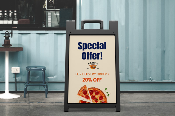 Special offer sandwich board displaying an image of a pizza and a promotional message.