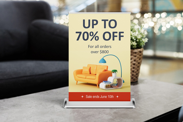Pull-up tabletop banner displaying promotional offers at a shopping center.
